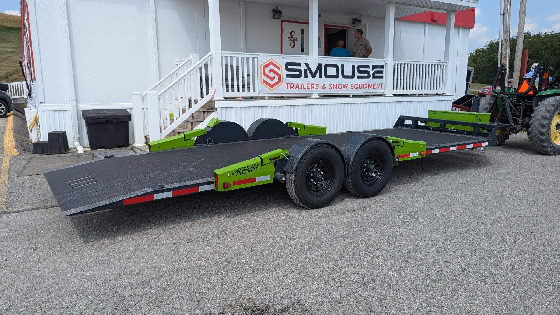 New 2025 FlatTrak by Belmont 7x22 HD Lay Flat Tilt Equipment Hauler w/ Hydraulic Jack