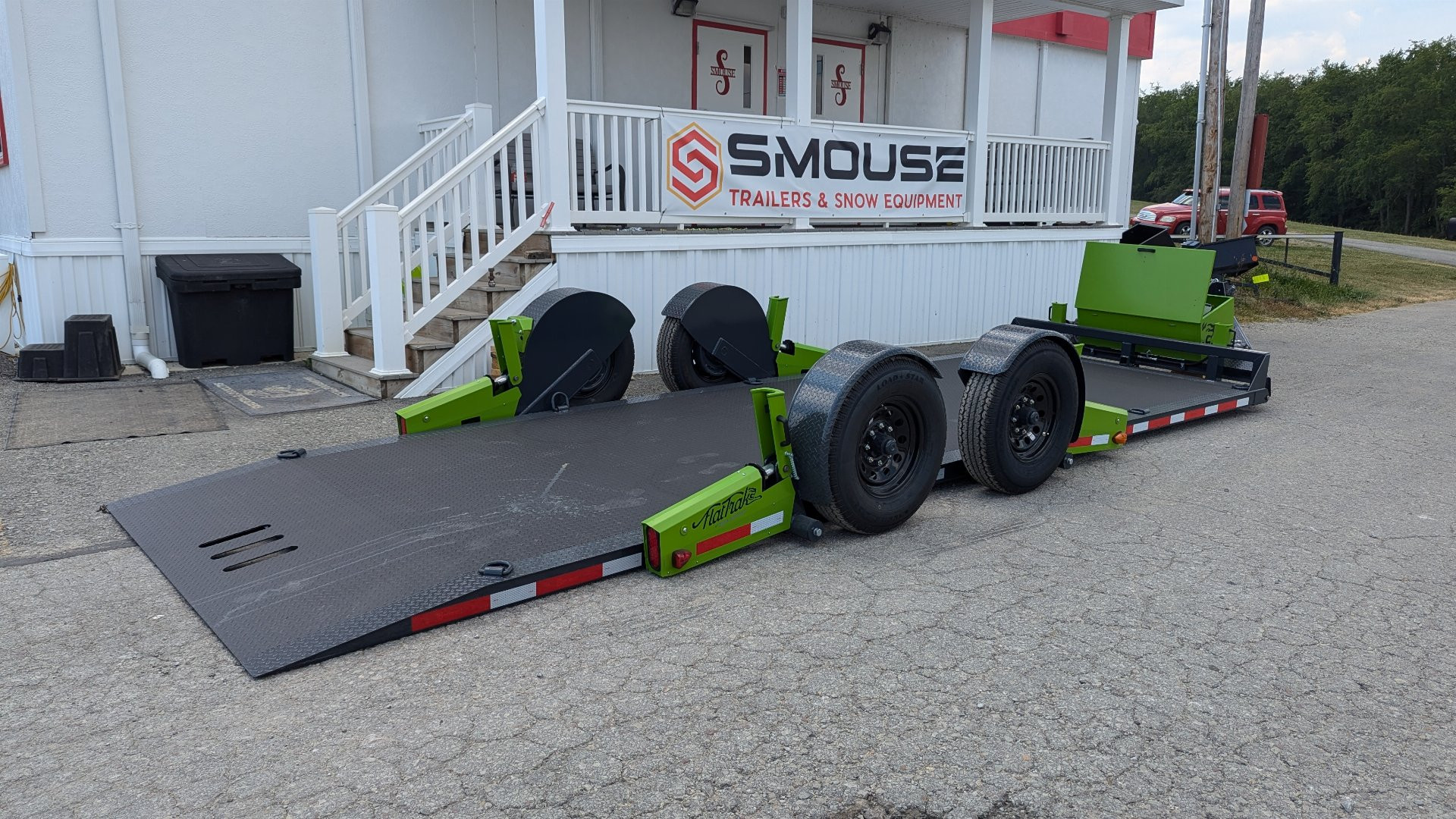 New 2025 FlatTrak by Belmont 7x22 HD Lay Flat Tilt Equipment Hauler w/ Hydraulic Jack