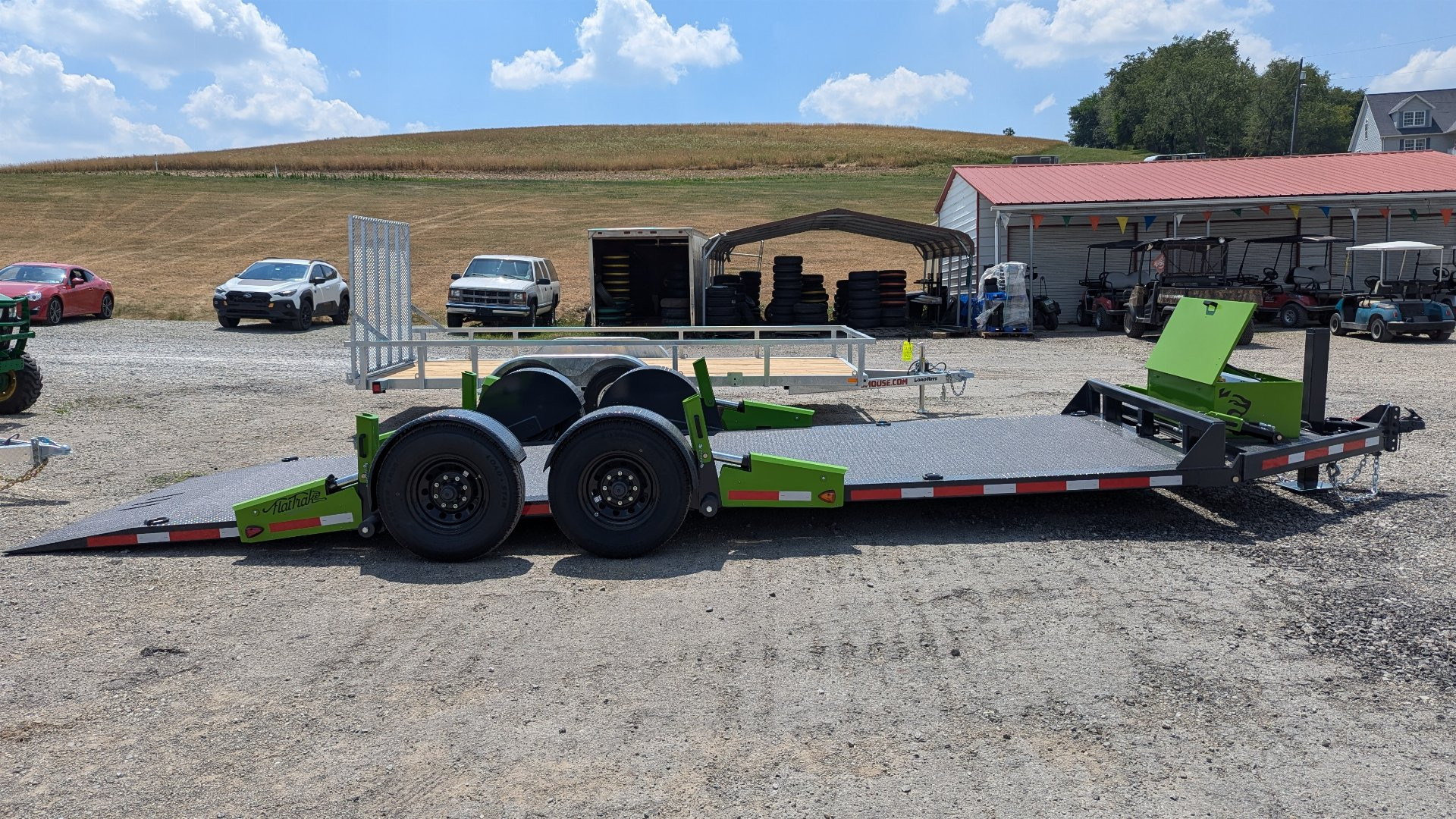 New 2025 FlatTrak by Belmont 7x22 HD Lay Flat Tilt Equipment Hauler w/ Hydraulic Jack