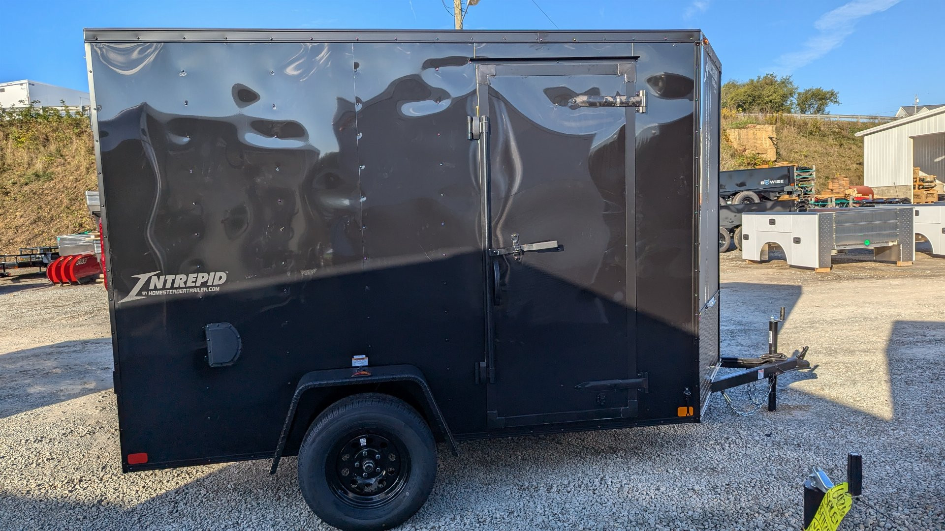 New 2025 Homesteader 6x10 Intrepid V-Nose Cargo Trailer w/ Ramp Door