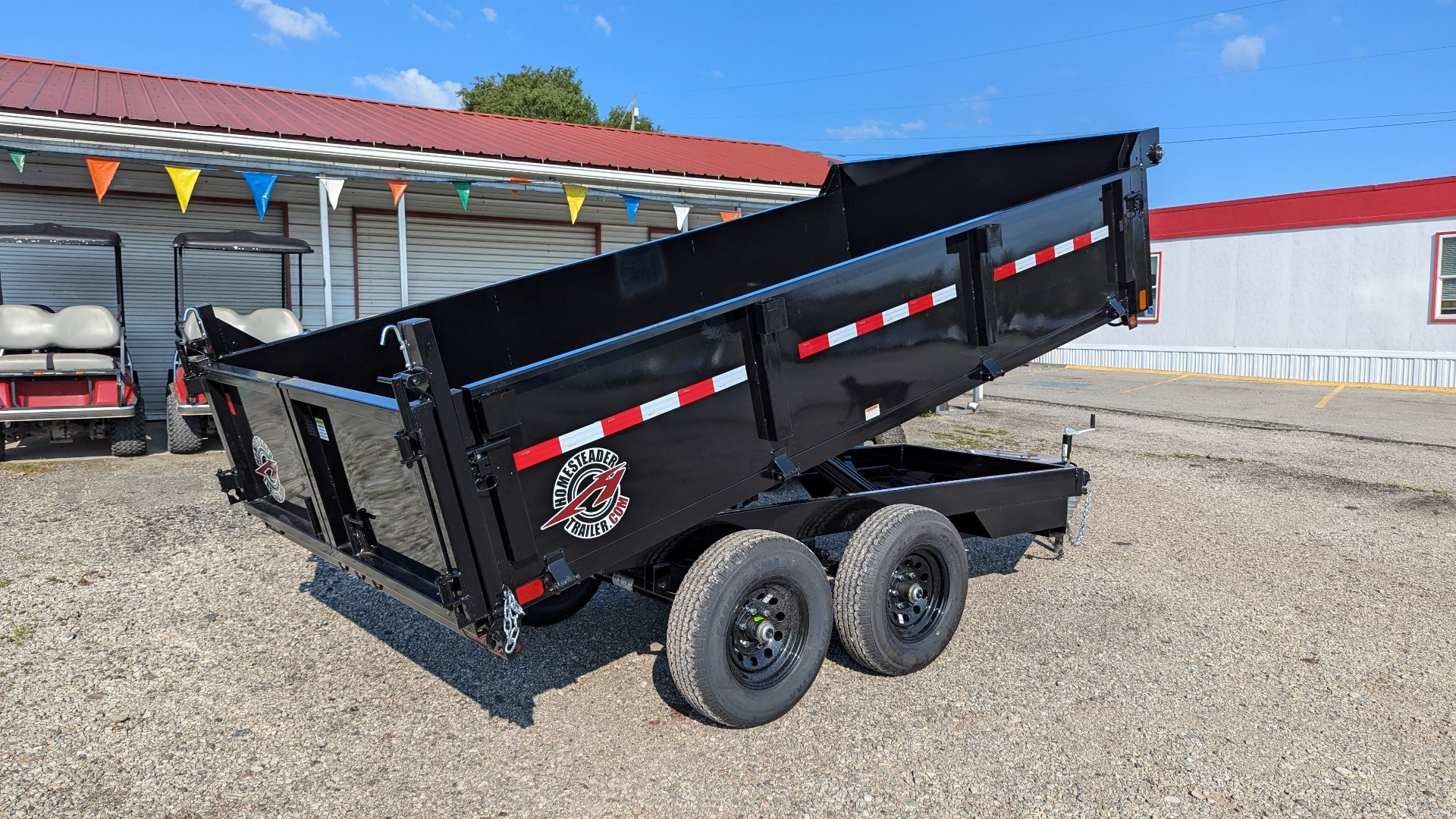 New 2025 Homesteader 6x12 Deckover Dump Trailer w/ Dropside on Curbside & Barn/Spreader Gate