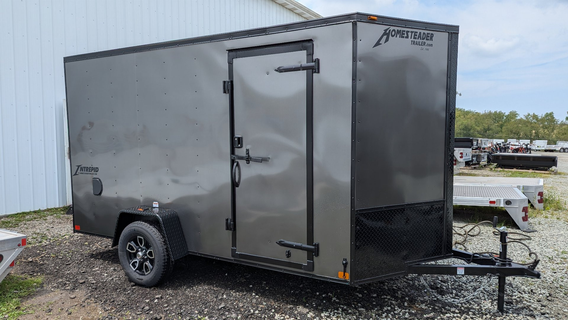 New 2025 Homesteader 6x12 Intrepid V-Nose Cargo Trailer w/ Ramp Door (.080 POLYCOR EXTERIOR!!!)