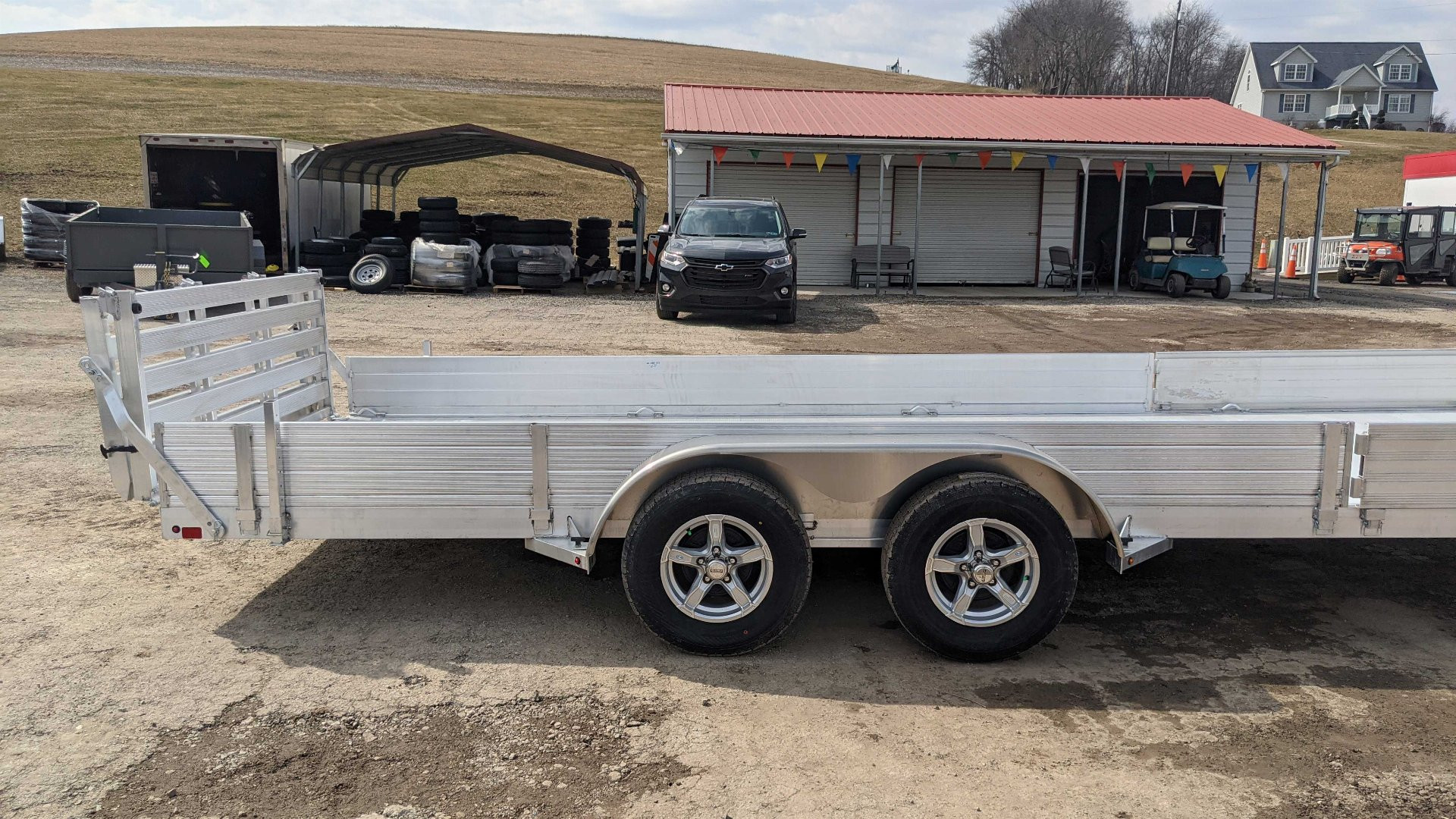 New 2025 Aluma 6'9" x 22 SR Utility Trailer w/ Side Ramps, Solid Rear Sides & Bi-Fold Gate (LEFTOVER PRICING!!!)