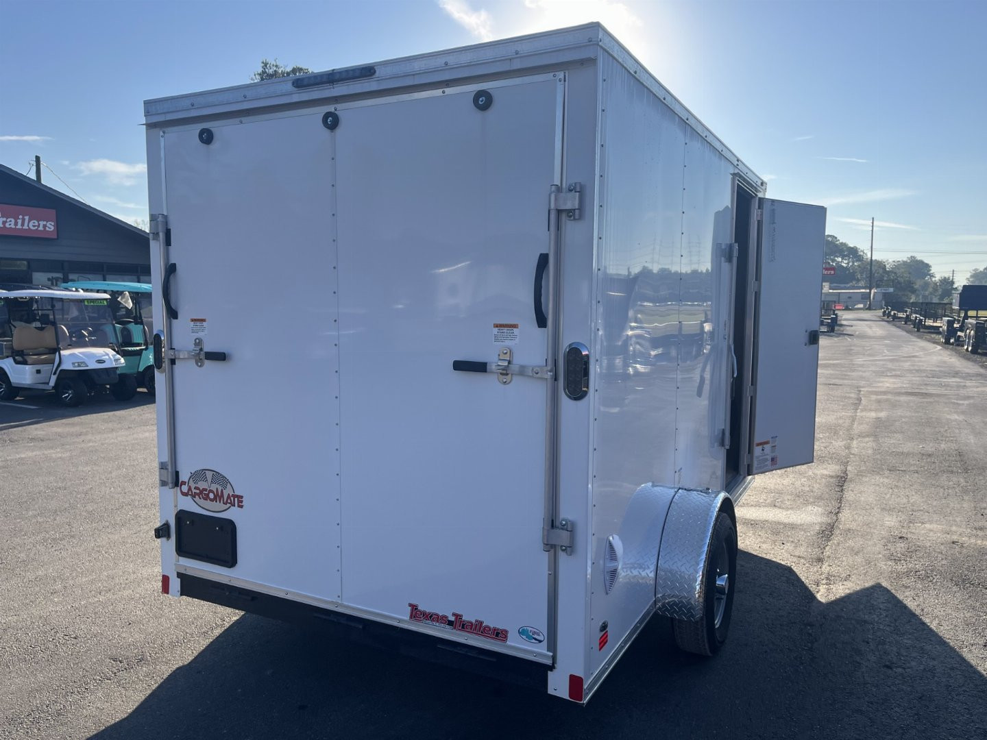 New GANS712SA CARGO MATE 7' X 12' ENCLOSED CARGO TRAILER W/ REAR RAMP DOOR, SIDE DOOR, & UPGRADES