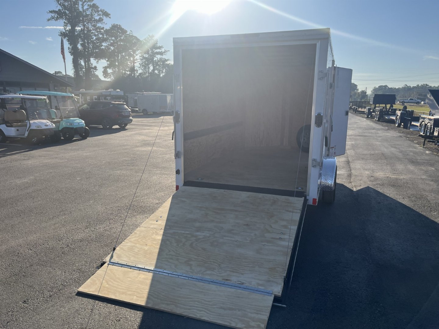 New GANS712SA CARGO MATE 7' X 12' ENCLOSED CARGO TRAILER W/ REAR RAMP DOOR, SIDE DOOR, & UPGRADES