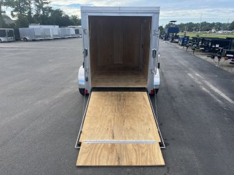 Used USED 2023 CARGO MATE GANS58SA 5'X8' ENCLOSED CARGO TRAILER W/ REAR RAMP DOOR & SIDE DOOR