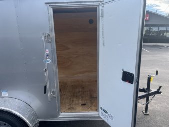 Used USED 2023 CARGO MATE GANS58SA 5'X8' ENCLOSED CARGO TRAILER W/ REAR RAMP DOOR & SIDE DOOR