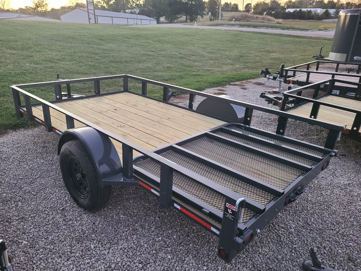 New Gray Heartland 76" X 12' SINGLE AXLE 4' REAR GATE, 4" CH TONGUE