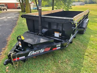 New Liberty 83 x 16' telescopic dump, 8k axles, 7 gauge floor, fork carrier