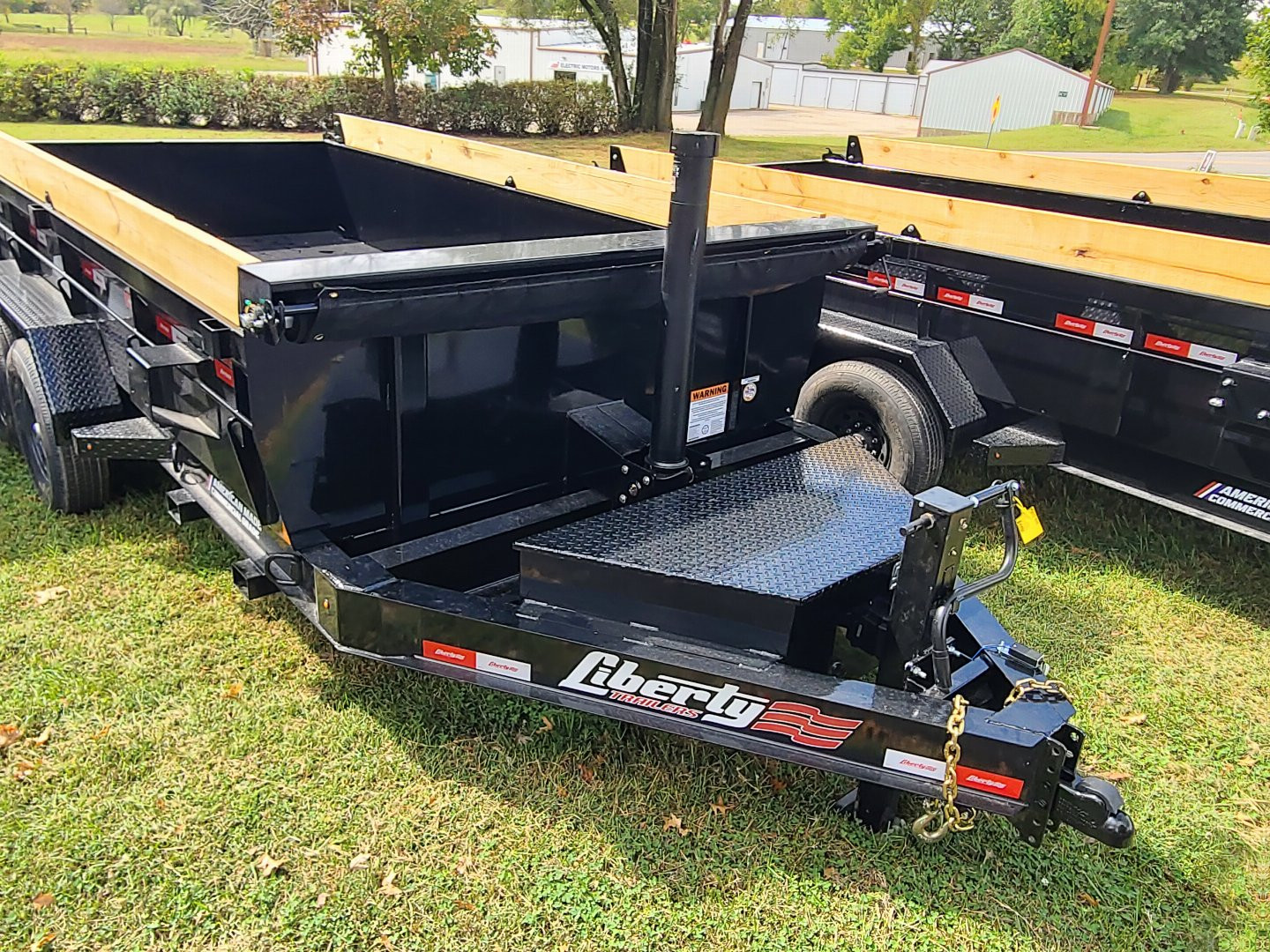 New Liberty 83 x 14' telescopic dump bed, 7k axles, 7 gauge floor, fork carrier