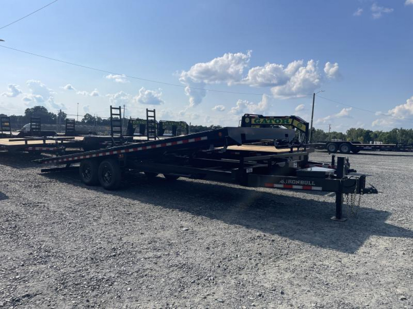 New 2026 IRON BULL 102" x 24' power tilt Deckover Trailer