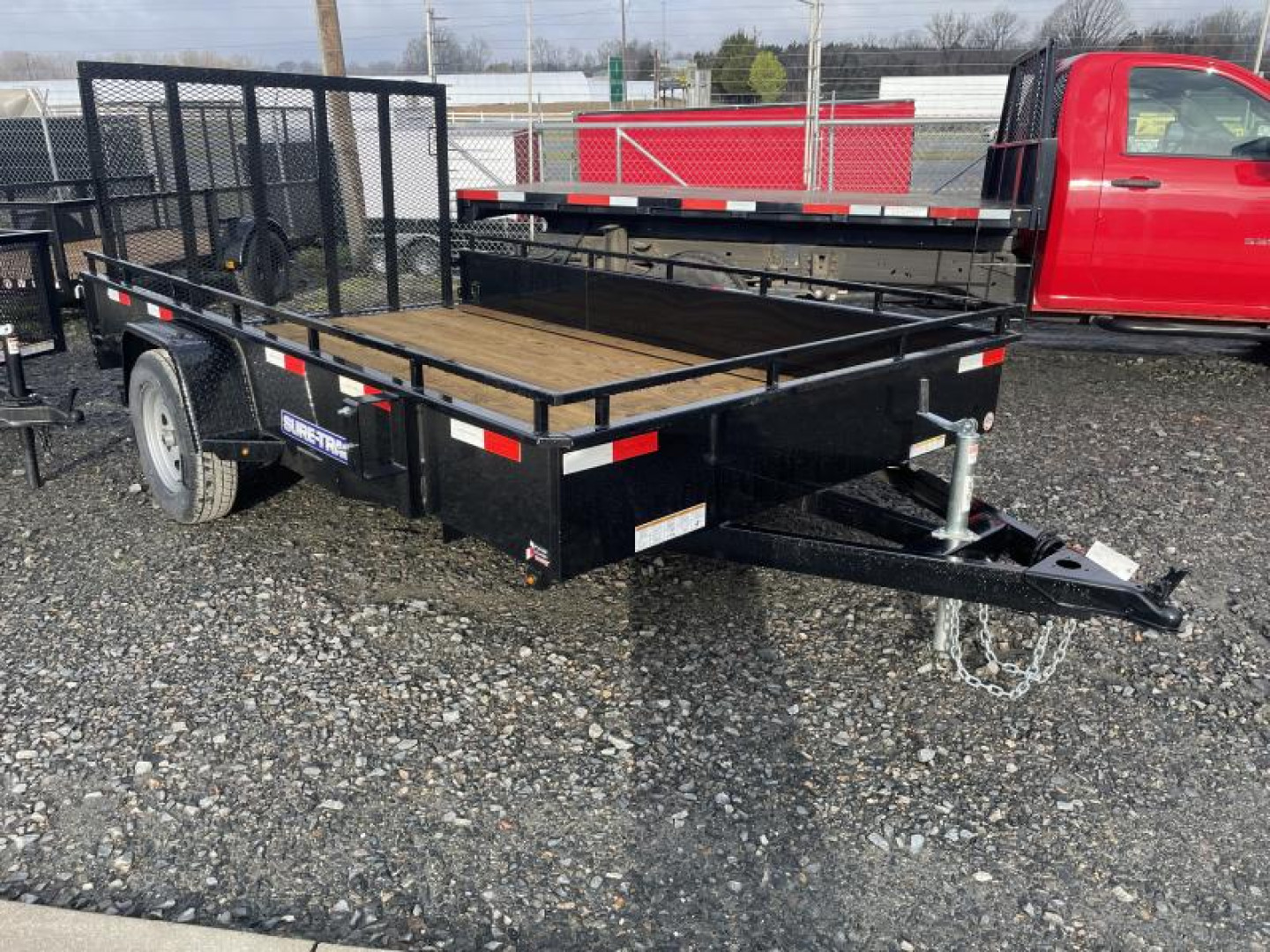 New 2025 SURE-TRAC 7x12 with 20" metal sides Landscape Trailer