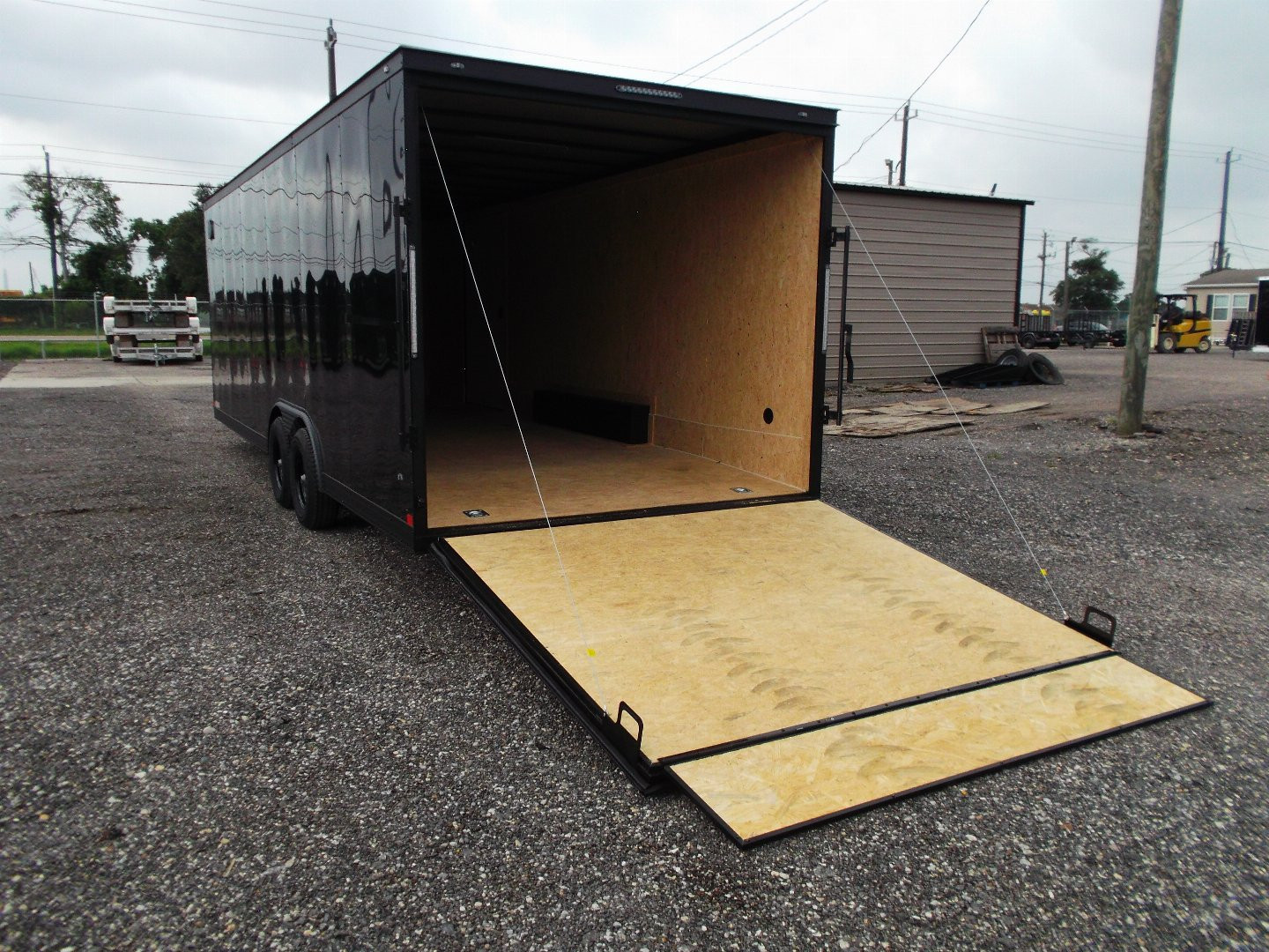 New 2025 COVERED WAGON TRAILERS 8.5x24 Cargo Trailer / Enclosed Car Hauler / 7ft Interior / 5200# Axles / Extra Wide Ramp Door / 48" RV Side Door / Bed Lined RV Step / .030 Black Semi-Screwless Exterior / Black Out Package