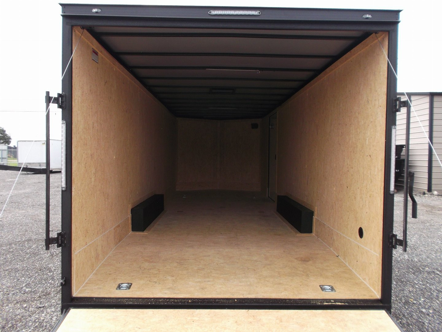 New 2025 COVERED WAGON TRAILERS 8.5x24 Cargo Trailer / Enclosed Car Hauler / 7ft Interior / 5200# Axles / Extra Wide Ramp Door / 48" RV Side Door / Bed Lined RV Step / .030 Black Semi-Screwless Exterior / Black Out Package