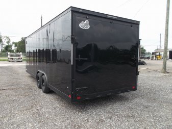 New 2025 COVERED WAGON TRAILERS 8.5x24 Cargo Trailer / Enclosed Car Hauler / 7ft Interior / 5200# Axles / Extra Wide Ramp Door / 48" RV Side Door / Bed Lined RV Step / .030 Black Semi-Screwless Exterior / Black Out Package