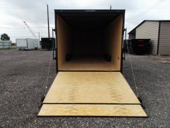 New 2025 COVERED WAGON TRAILERS 8.5x24 Cargo Trailer / Enclosed Car Hauler / 7ft Interior / 5200# Axles / Extra Wide Ramp Door / 48" RV Side Door / Bed Lined RV Step / .030 Black Semi-Screwless Exterior / Black Out Package