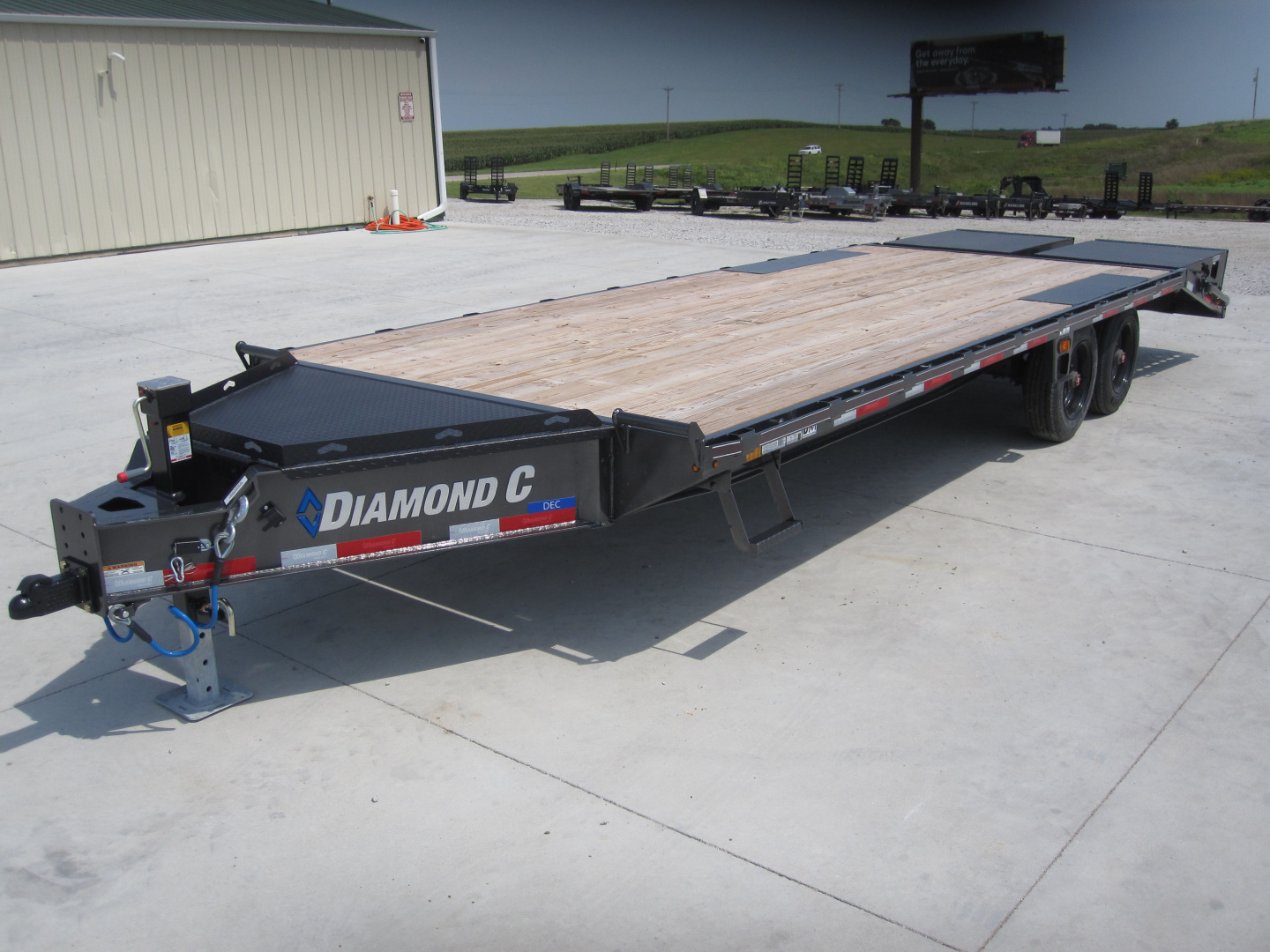 New 2025 Diamond C Trailers DEC-210 102x24 Flatbed Trailer