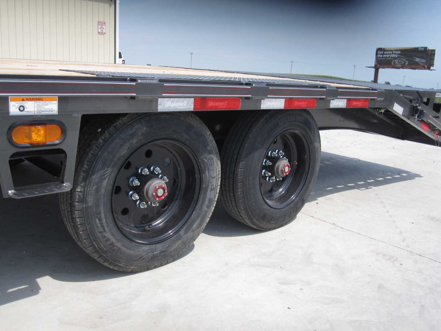 New 2025 Diamond C Trailers DEC-210 102x24 Flatbed Trailer