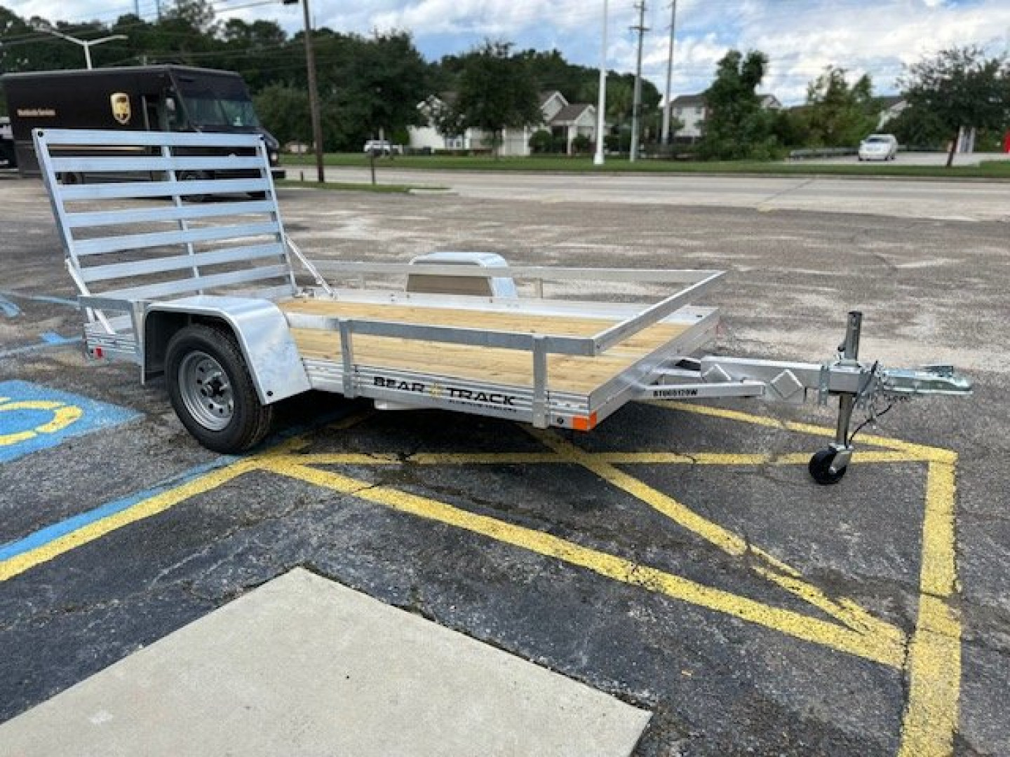 New 2025 BEAR TRACK 5.5x10SA Utility Trailer