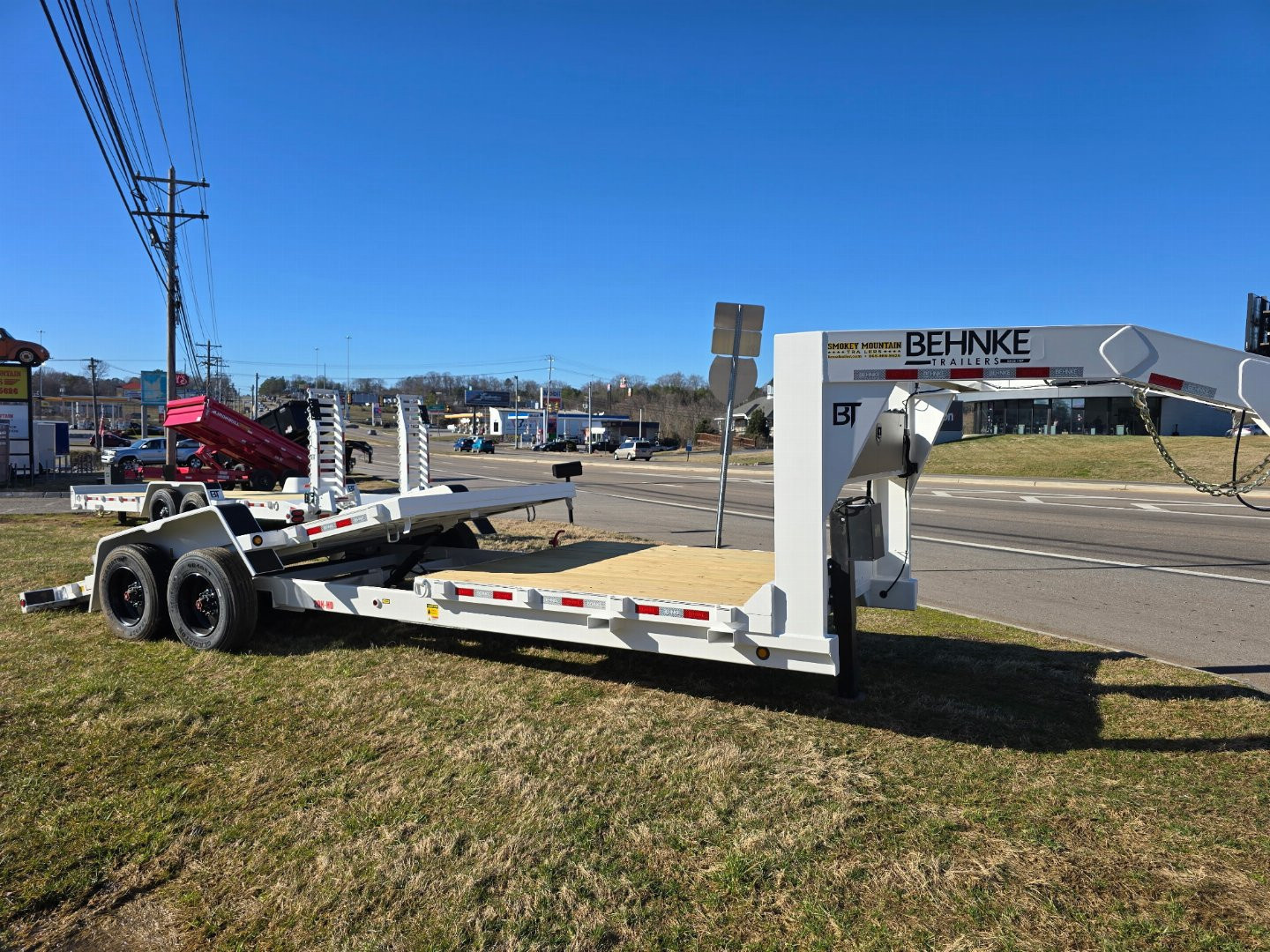 New 2025 Behnke TBCT 20K GN TILT 24' Equipment Trailer