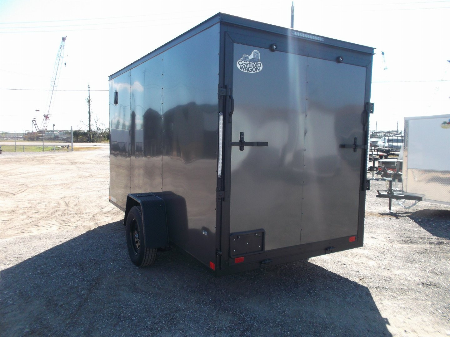New 2025 COVERED WAGON TRAILERS 6x12 Single Axle Cargo / Enclosed Trailer / 6'6" Interior / Extra Wide Ramp / RV Side Door / LEDs / .030 Charcoal Gray Semi-Screwless Exterior / Black Out Package