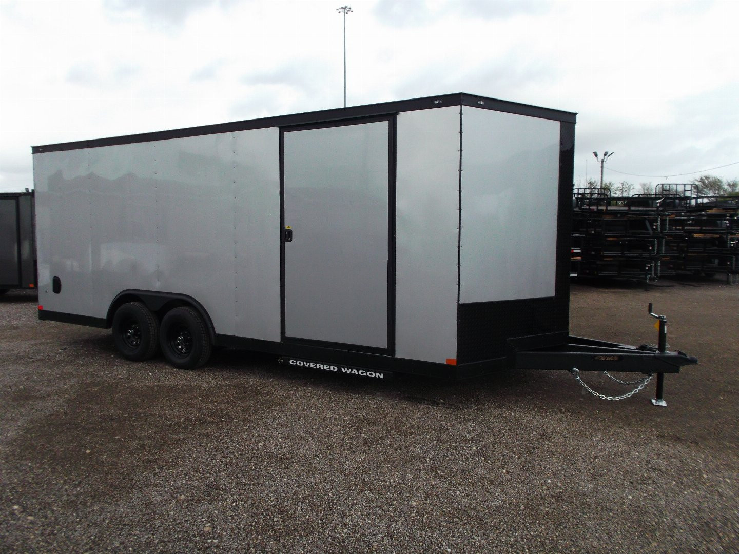 New 2025 Covered Wagon Trailers 8.5x24 Cargo / Enclosed Trailer / Race Trailer / 7ft Interior / 5200# Axles / Black Out Package / Silver .030 Semi- Screwless Exterior / Extra Wide Ramp / 48" RV Side Door / RV Step