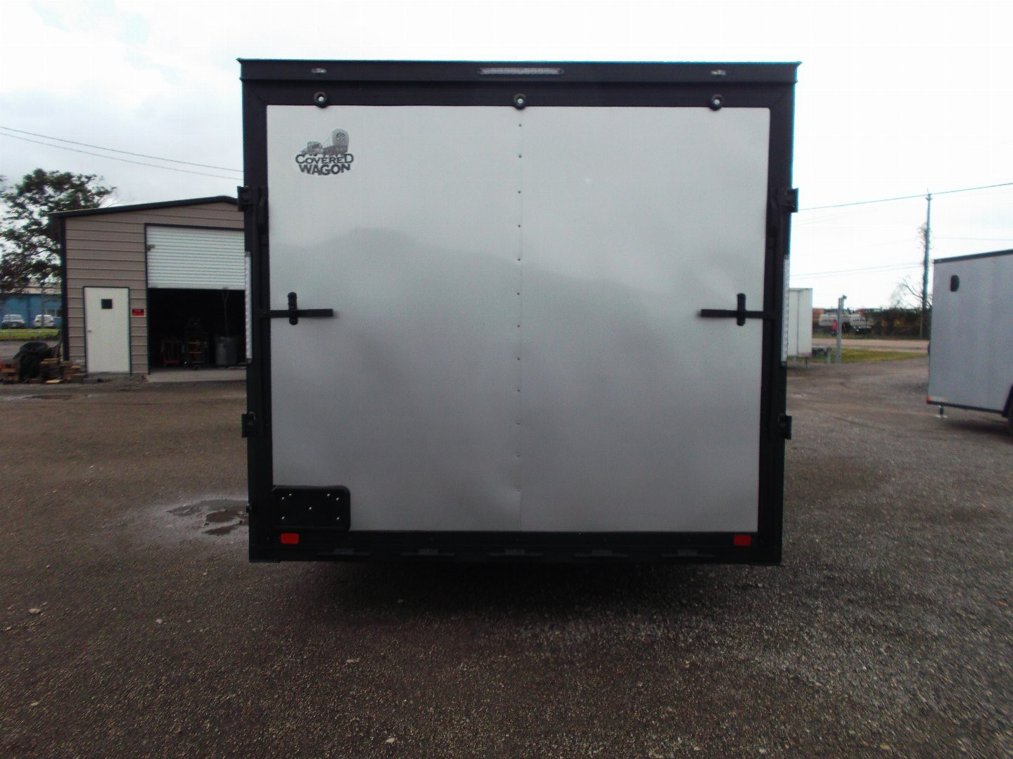 New 2025 Covered Wagon Trailers 8.5x24 Cargo / Enclosed Trailer / Race Trailer / 7ft Interior / 5200# Axles / Black Out Package / Silver .030 Semi- Screwless Exterior / Extra Wide Ramp / 48" RV Side Door / RV Step