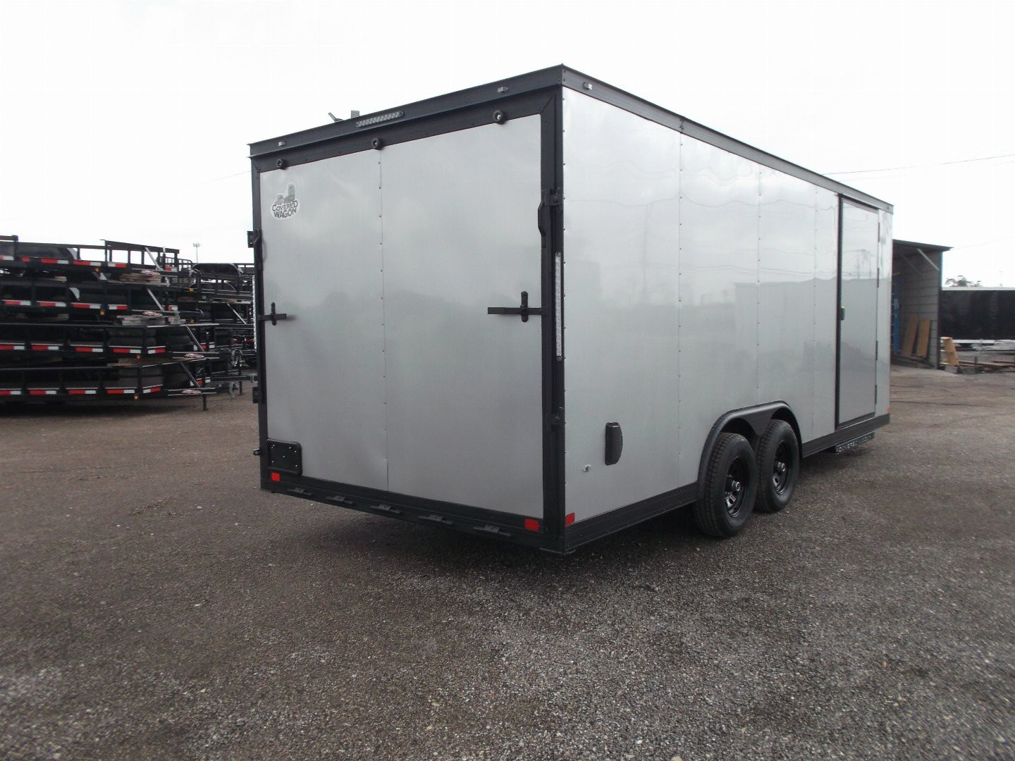 New 2025 Covered Wagon Trailers 8.5x24 Cargo / Enclosed Trailer / Race Trailer / 7ft Interior / 5200# Axles / Black Out Package / Silver .030 Semi- Screwless Exterior / Extra Wide Ramp / 48" RV Side Door / RV Step