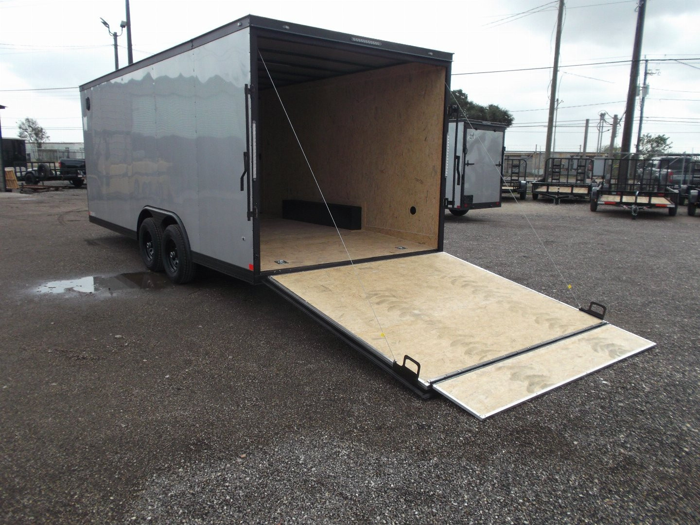 New 2025 Covered Wagon Trailers 8.5x24 Cargo / Enclosed Trailer / Race Trailer / 7ft Interior / 5200# Axles / Black Out Package / Silver .030 Semi- Screwless Exterior / Extra Wide Ramp / 48" RV Side Door / RV Step