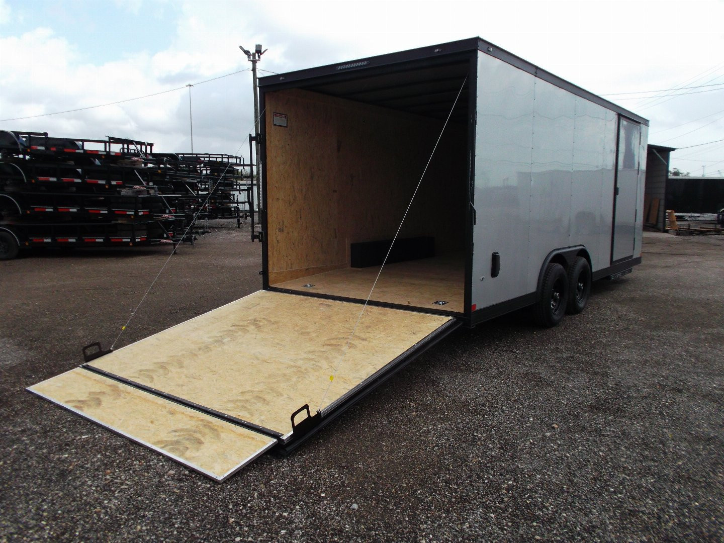 New 2025 Covered Wagon Trailers 8.5x24 Cargo / Enclosed Trailer / Race Trailer / 7ft Interior / 5200# Axles / Black Out Package / Silver .030 Semi- Screwless Exterior / Extra Wide Ramp / 48" RV Side Door / RV Step