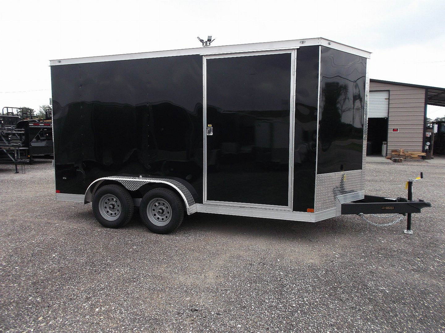 New 2025 COVERED WAGON TRAILERS 7x12 Tandem Axle Cargo Trailer / Enclosed Trailer / 6'6" Interior / Extra Wide Ramp / 36" RV Door / LEDs / .030 Black Semi-Screwless Exterior