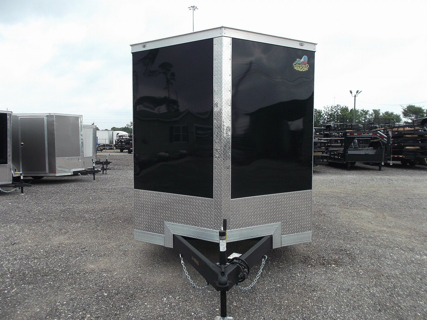 New 2025 COVERED WAGON TRAILERS 7x12 Tandem Axle Cargo Trailer / Enclosed Trailer / 6'6" Interior / Extra Wide Ramp / 36" RV Door / LEDs / .030 Black Semi-Screwless Exterior