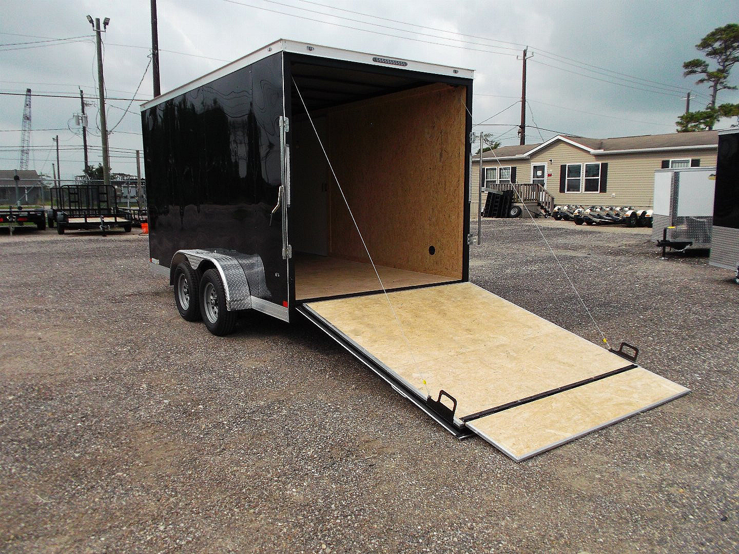New 2025 COVERED WAGON TRAILERS 7x12 Tandem Axle Cargo Trailer / Enclosed Trailer / 6'6" Interior / Extra Wide Ramp / 36" RV Door / LEDs / .030 Black Semi-Screwless Exterior
