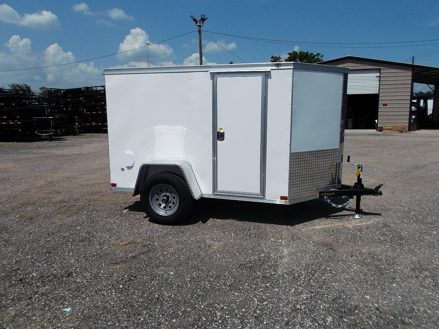 New 2025 COVERED WAGON TRAILERS 5x8 Cargo Trailer / Enclosed Cargo Trailer / Ramp / RV Side Door / Bed Lined Tongue and Frame / .030 White Semi-Screwless Exterior