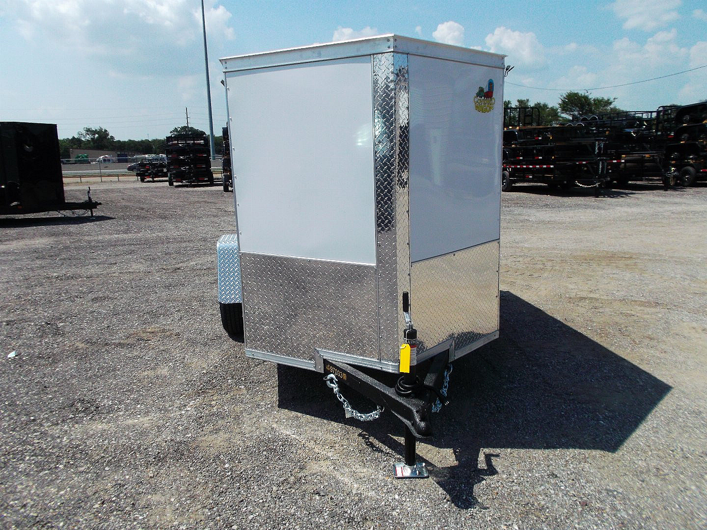 New 2025 COVERED WAGON TRAILERS 5x8 Cargo Trailer / Enclosed Cargo Trailer / Ramp / RV Side Door / Bed Lined Tongue and Frame / .030 White Semi-Screwless Exterior