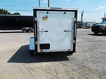 New 2025 COVERED WAGON TRAILERS 5x8 Cargo Trailer / Enclosed Cargo Trailer / Ramp / RV Side Door / Bed Lined Tongue and Frame / .030 White Semi-Screwless Exterior