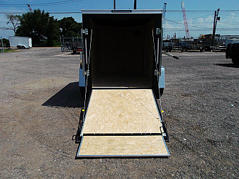New 2025 COVERED WAGON TRAILERS 5x8 Cargo Trailer / Enclosed Cargo Trailer / Ramp / RV Side Door / Bed Lined Tongue and Frame / .030 White Semi-Screwless Exterior