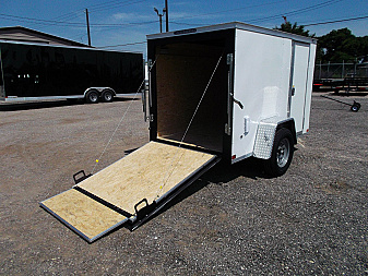 New 2025 COVERED WAGON TRAILERS 5x8 Cargo Trailer / Enclosed Cargo Trailer / Ramp / RV Side Door / Bed Lined Tongue and Frame / .030 White Semi-Screwless Exterior