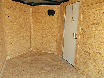 New 2025 COVERED WAGON TRAILERS 5x8 Cargo Trailer / Enclosed Cargo Trailer / Ramp / RV Side Door / Bed Lined Tongue and Frame / .030 White Semi-Screwless Exterior
