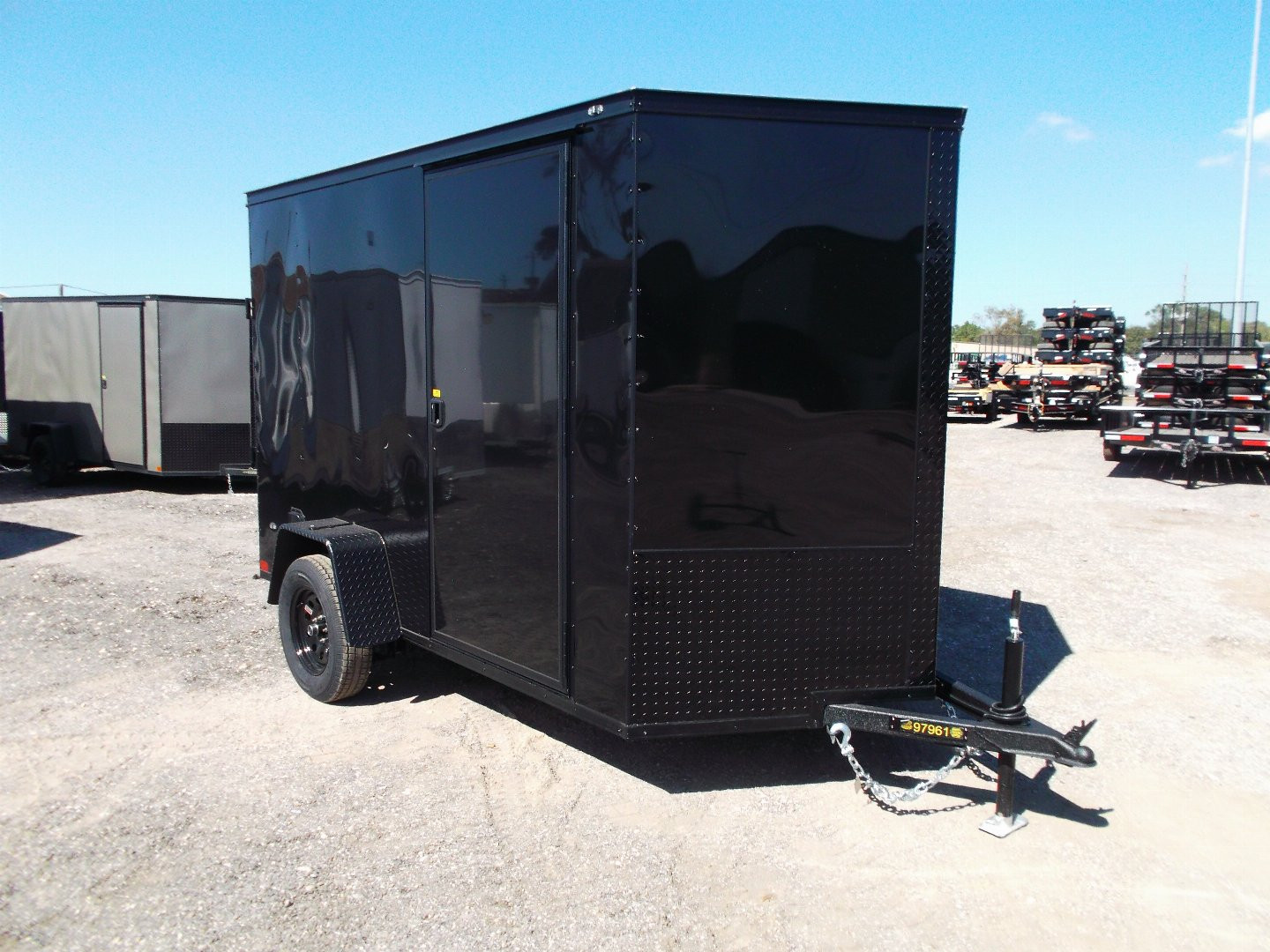 New 2025 COVERED WAGON TRAILERS 6x10 Single Axle Cargo / Enclosed Trailer / 6'6" Interior Height / Extra Wide Ramp Gate / RV Side Door / LEDs / .030 Black Semi-Screwless Exterior / Black Out Package