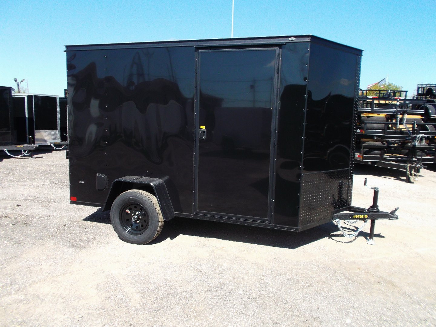 New 2025 COVERED WAGON TRAILERS 6x10 Single Axle Cargo / Enclosed Trailer / 6'6" Interior Height / Extra Wide Ramp Gate / RV Side Door / LEDs / .030 Black Semi-Screwless Exterior / Black Out Package