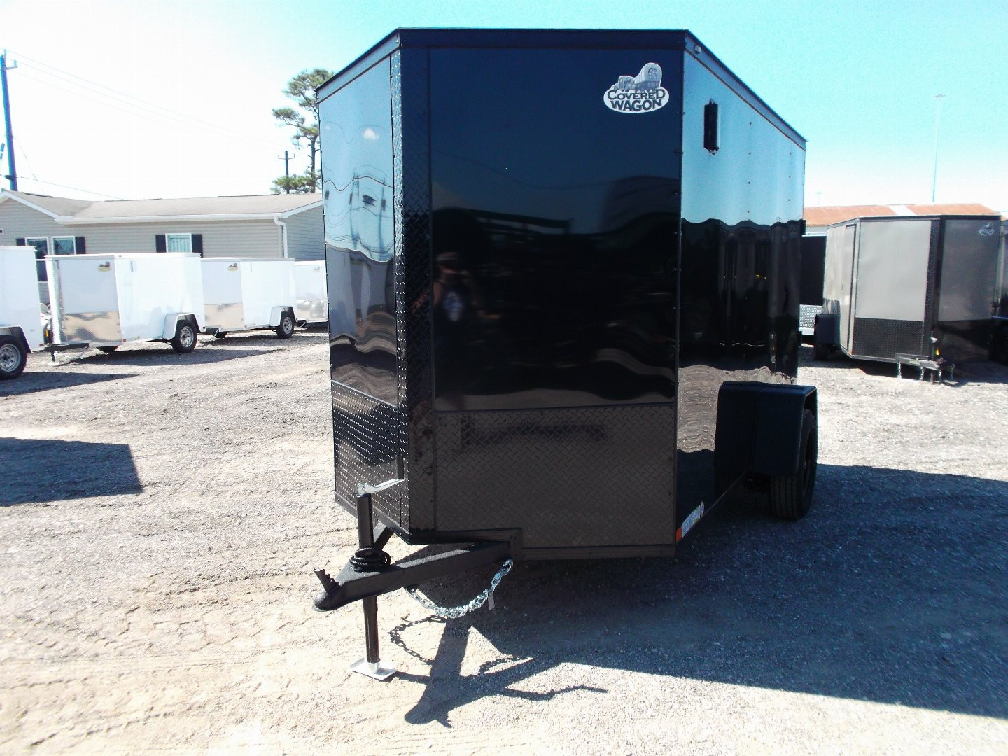 New 2025 COVERED WAGON TRAILERS 6x10 Single Axle Cargo / Enclosed Trailer / 6'6" Interior Height / Extra Wide Ramp Gate / RV Side Door / LEDs / .030 Black Semi-Screwless Exterior / Black Out Package