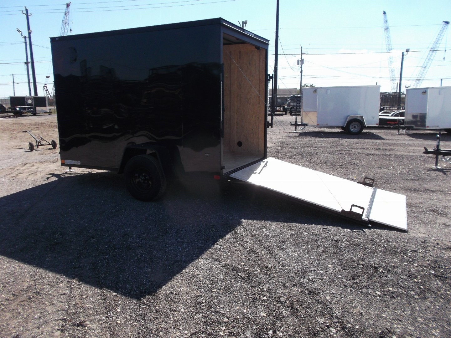 New 2025 COVERED WAGON TRAILERS 6x10 Single Axle Cargo / Enclosed Trailer / 6'6" Interior Height / Extra Wide Ramp Gate / RV Side Door / LEDs / .030 Black Semi-Screwless Exterior / Black Out Package
