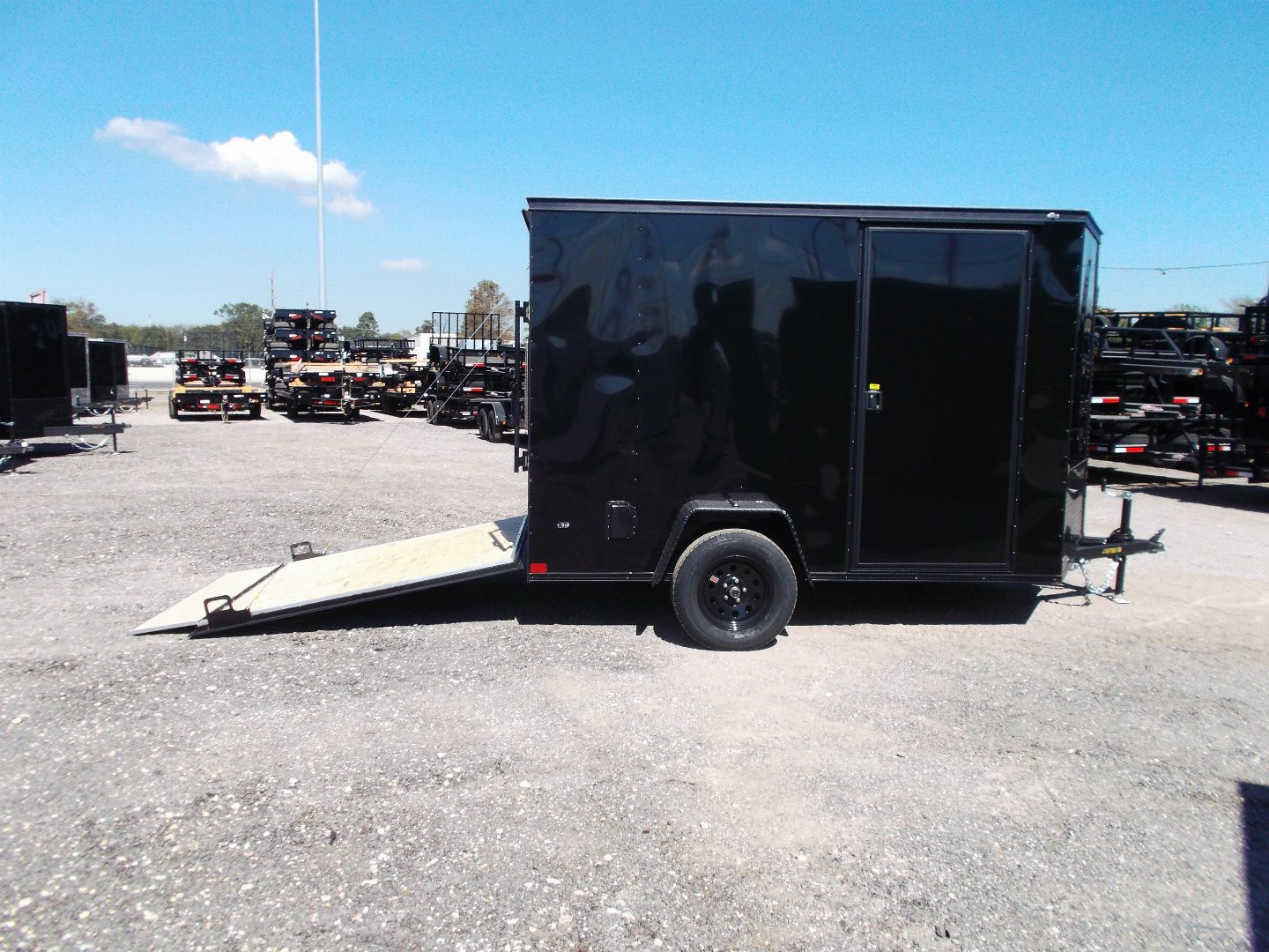 New 2025 COVERED WAGON TRAILERS 6x10 Single Axle Cargo / Enclosed Trailer / 6'6" Interior Height / Extra Wide Ramp Gate / RV Side Door / LEDs / .030 Black Semi-Screwless Exterior / Black Out Package