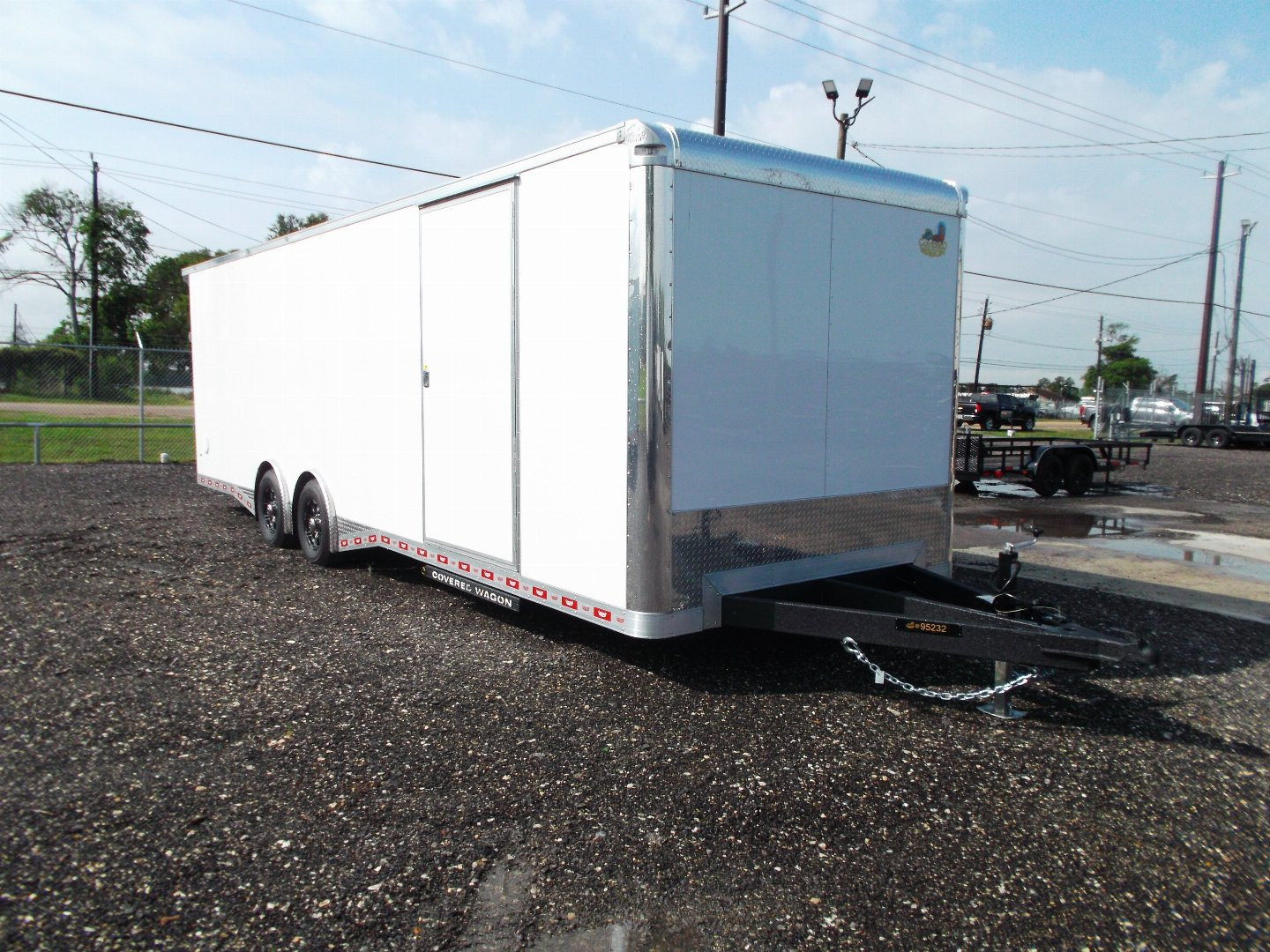 New 2025 COVERED WAGON 8.5x28 Enclosed Race Trailer / Cargo Trailer / XXL Package / 7'6" Interior Height / Split 7000# Torsion Axles / Heavy Duty Extra Wide Ramp / .080 White Poly Core Exterior / Mag Wheels / Rear Spoiler / Side Wall Escape Door