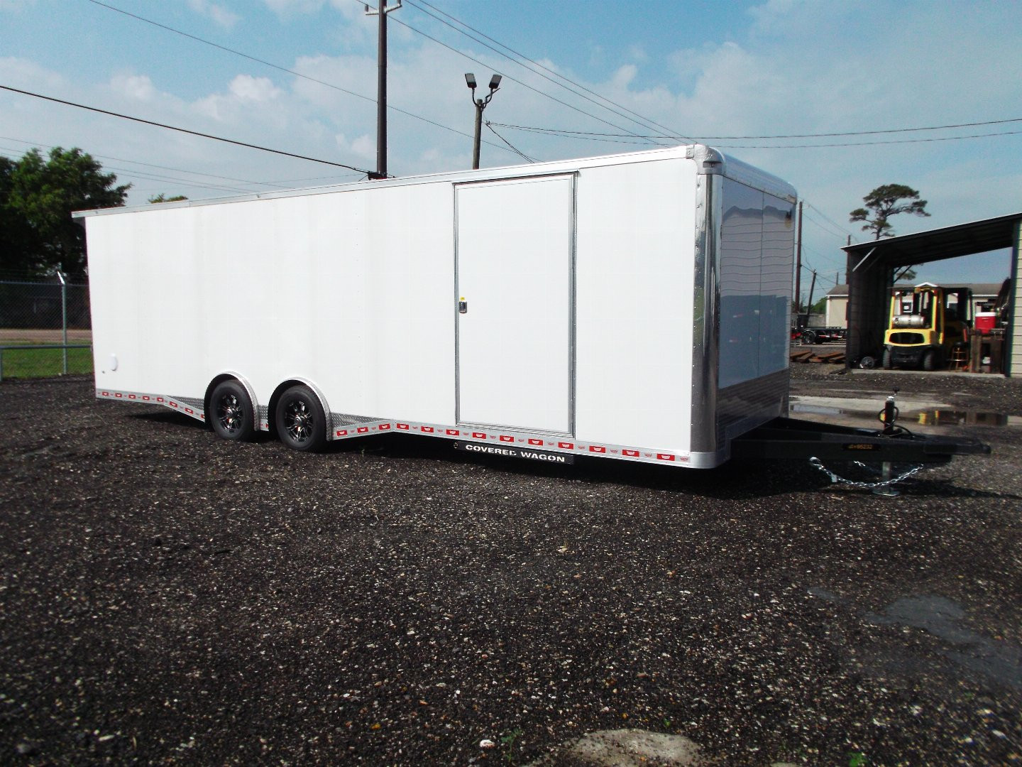 New 2025 COVERED WAGON 8.5x28 Enclosed Race Trailer / Cargo Trailer / XXL Package / 7'6" Interior Height / Split 7000# Torsion Axles / Heavy Duty Extra Wide Ramp / .080 White Poly Core Exterior / Mag Wheels / Rear Spoiler / Side Wall Escape Door