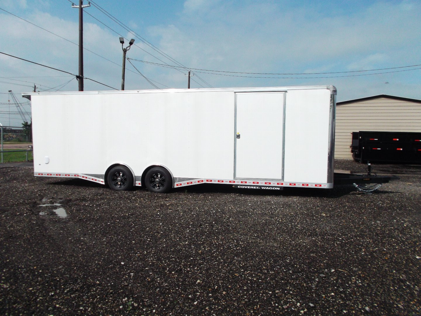 New 2025 COVERED WAGON 8.5x28 Enclosed Race Trailer / Cargo Trailer / XXL Package / 7'6" Interior Height / Split 7000# Torsion Axles / Heavy Duty Extra Wide Ramp / .080 White Poly Core Exterior / Mag Wheels / Rear Spoiler / Side Wall Escape Door