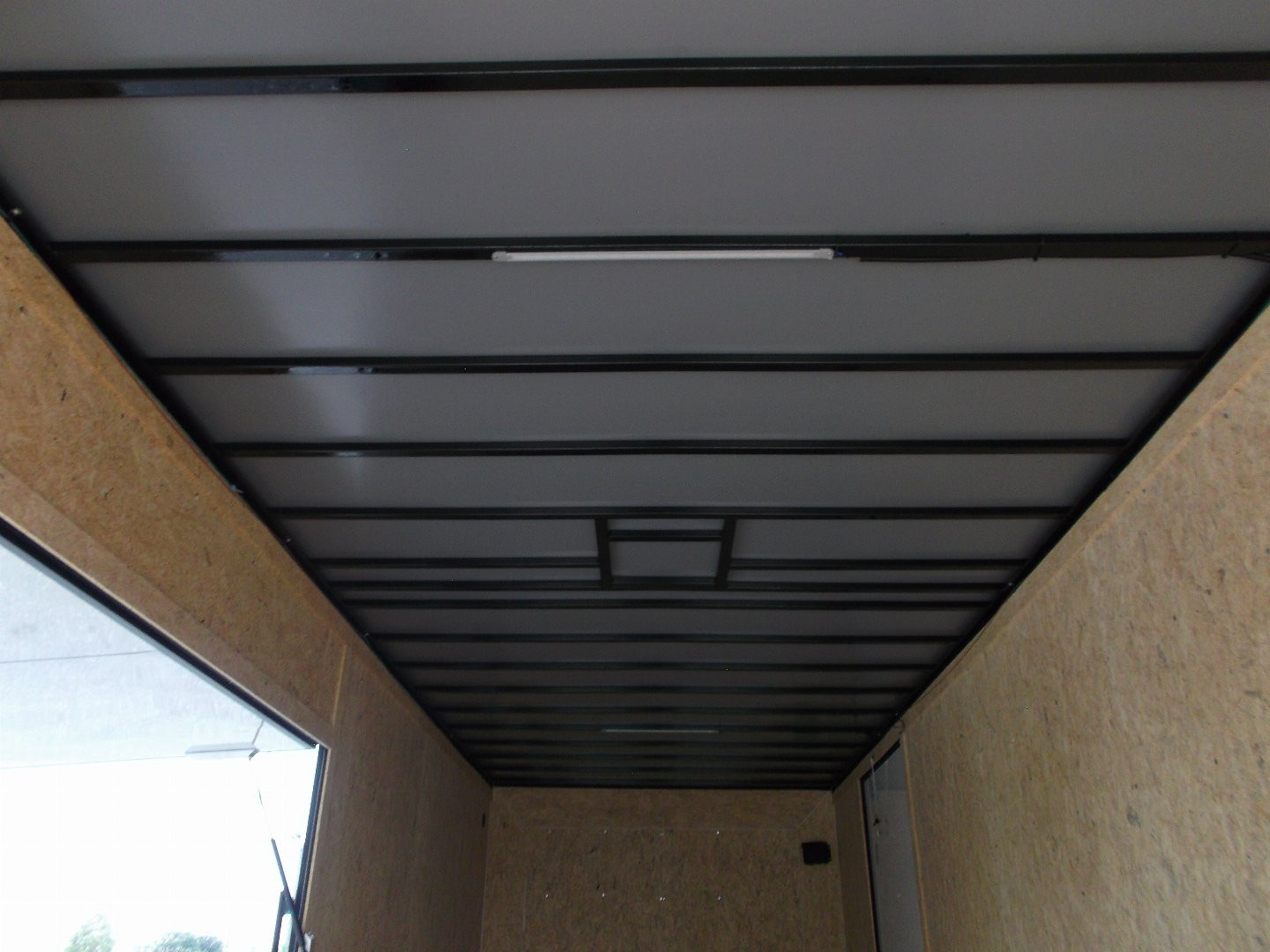 New 2025 COVERED WAGON 8.5x28 Enclosed Race Trailer / Cargo Trailer / XXL Package / 7'6" Interior Height / Split 7000# Torsion Axles / Heavy Duty Extra Wide Ramp / .080 White Poly Core Exterior / Mag Wheels / Rear Spoiler / Side Wall Escape Door