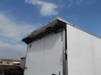 New 2025 COVERED WAGON 8.5x28 Enclosed Race Trailer / Cargo Trailer / XXL Package / 7'6" Interior Height / Split 7000# Torsion Axles / Heavy Duty Extra Wide Ramp / .080 White Poly Core Exterior / Mag Wheels / Rear Spoiler / Side Wall Escape Door