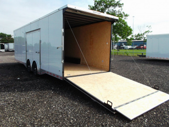 New 2025 COVERED WAGON 8.5x28 Enclosed Race Trailer / Cargo Trailer / XXL Package / 7'6" Interior Height / Split 7000# Torsion Axles / Heavy Duty Extra Wide Ramp / .080 White Poly Core Exterior / Mag Wheels / Rear Spoiler / Side Wall Escape Door